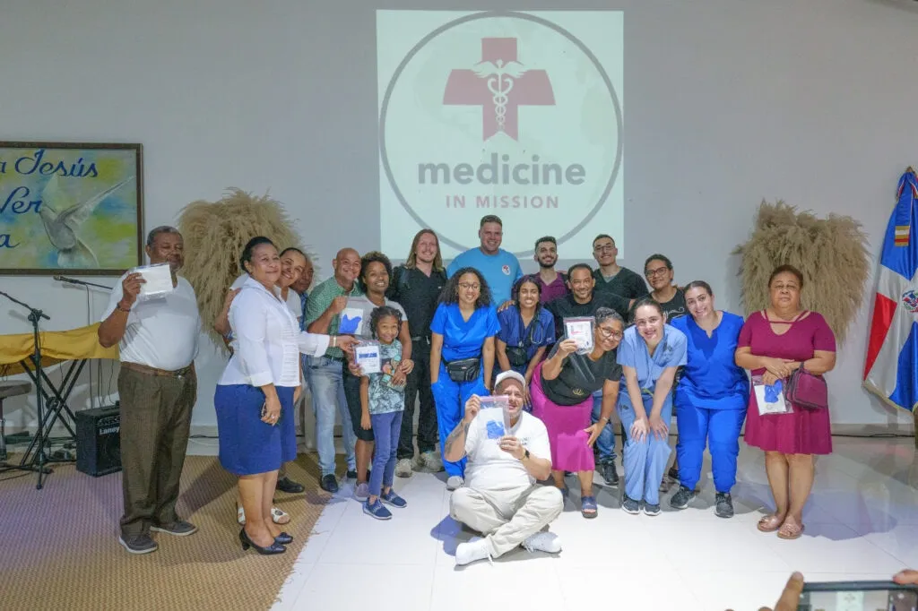A clinician examining a patient during the 2025 Dominican Republic mission